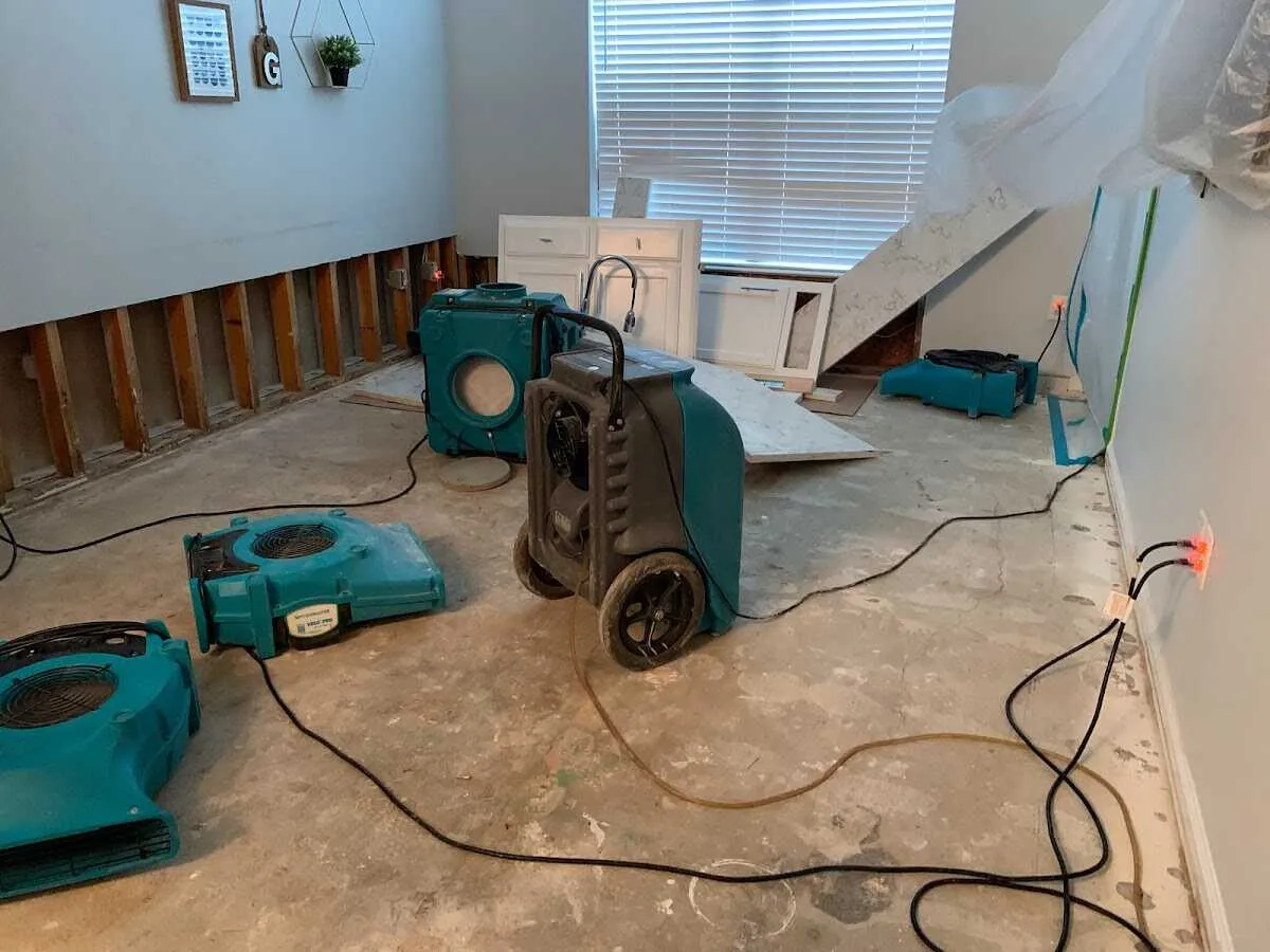 Dehumidifier in flood-cut room for Water Damage Restoration in Spanish Springs